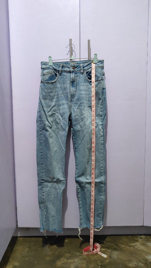 Pull & Bear Light Blue High Waist Jeans (Category: Jeans) located in Bacolor. Submitted by annjjjjj (Listing ID 1469657145, Image 3). Description: - Brand: Pull & Bear - Style: High waist, straight cut leg with raw frayed hem - Wash: Light wash denim - Details: Standard 5-pocket design, button and zip fly closure - Measurements: ~14" waist across (laying flat), ~39" total length - Condition/Vibe: Great casual staple, perfect for everyday wear wit