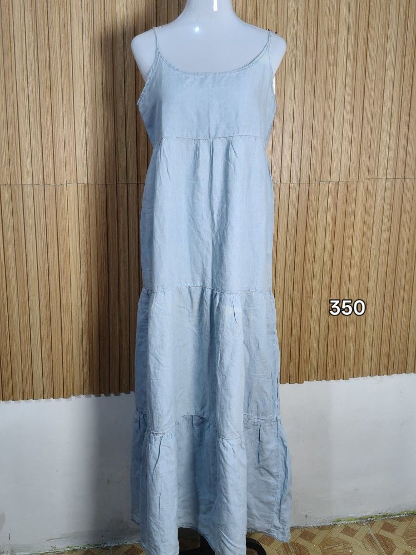 Pull&Bear Blue Tiered Maxi Dress Size L (Category: Dresses) located in Taguig. Submitted by ashie_clothing (Listing ID 1469687149, Image 2). Description: - Brand/Model: Pull&Bear Maxi Dress - Color: Light Blue - Size: L (Tag on collar) - Material & Feel: Light and breezy fabric, made in Cambodia - Design: Spaghetti straps, tiered skirt, long length - Flaws: Faint spot near the strap area and a light mark on the lower tier (priced accordingly).