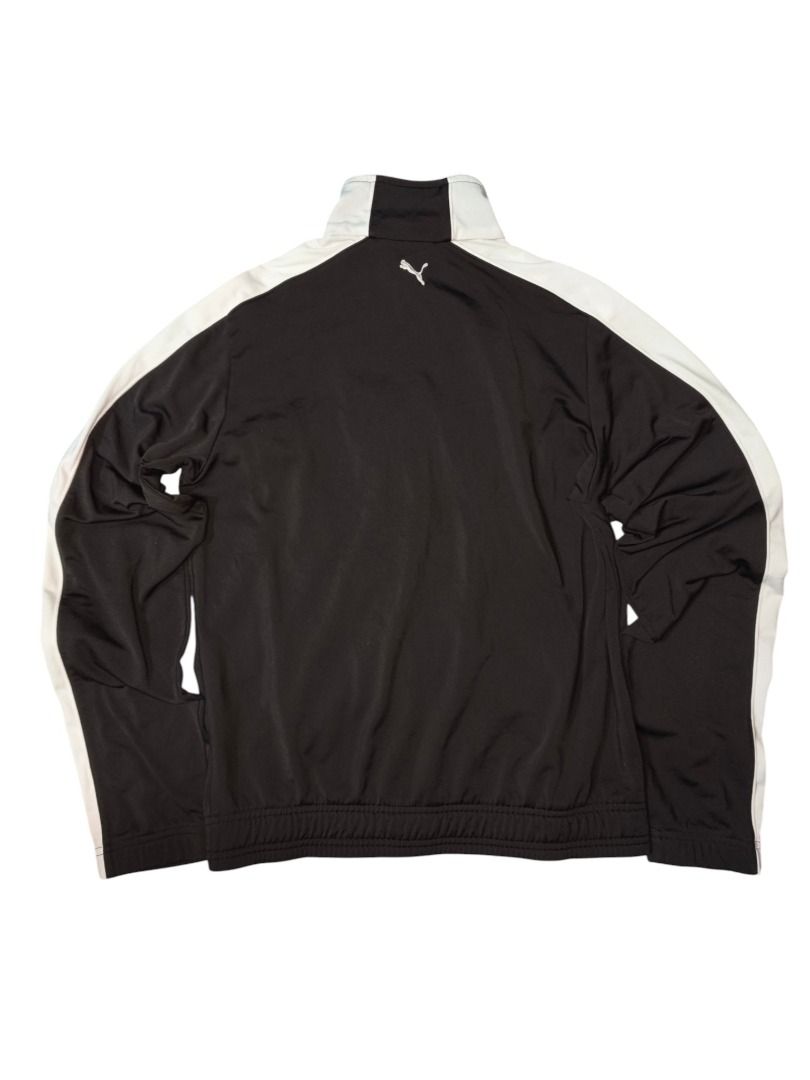 PUMA TRACK JACKET (Category: Coats, Jackets and Outerwear) located in Baguio. Submitted by boneteezandharmony (Listing ID 1469665137, Image 2). Description: Black Puma zip-up with white contrast sleeve panels and a clean chest logo. Easy everyday sportswear staple. Condition: Very Good Size on tag: M Dimes: Approx. 19” width × 23” length.