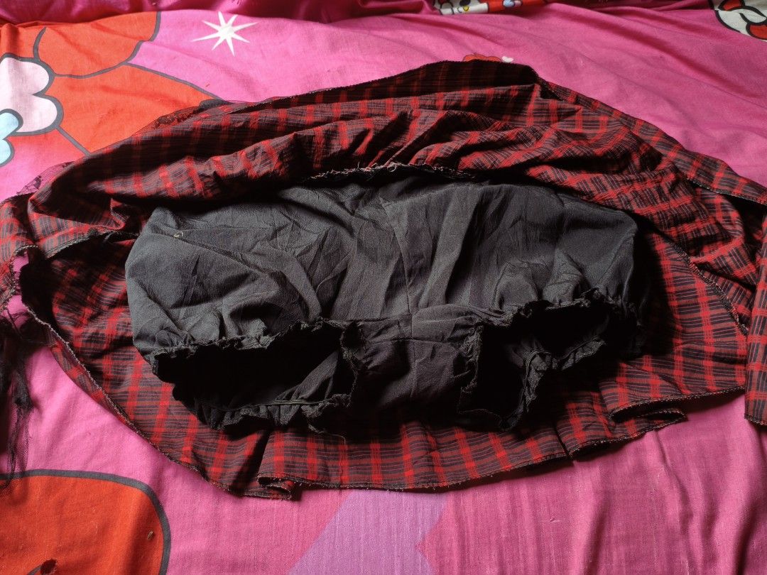 punk style skirt (Category: Skirts) located in Manila. Submitted by avwilynn (Listing ID 1469601488, Image 3). Description: *Red & Black Plaid Mini Skirt with Black Lace Overlay* Grunge / punk style skirt, thrifted. *Details:* - *Color:* Red and black checkered plaid, with black lace overlay on top - *Cut:* Mini length, flared / pleated, high-waisted with wide black waistband - *Waist:* Smocked / garterized at back (stretchy) + flat front panel, 