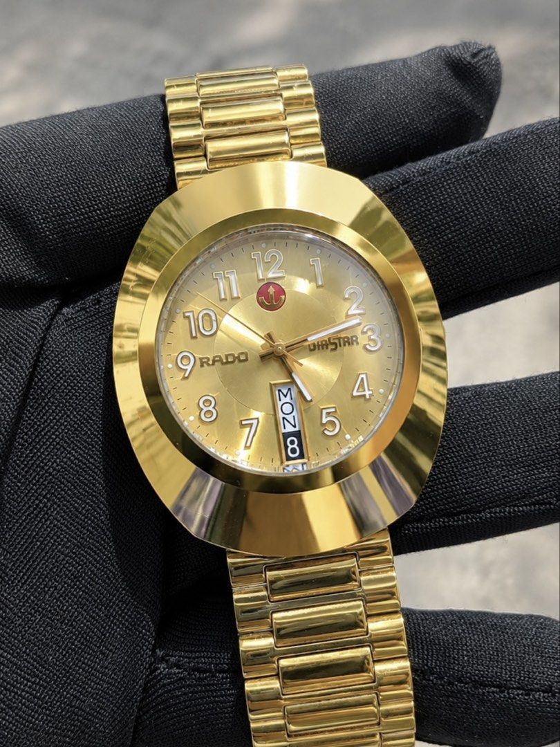 Rado DiaStar Gold Automatic Watch (Category: Luxury Watches) located in Baliuag. Submitted by clicksmileph (Listing ID 1469725454, Image 2). Description: Rado Diastar Original Gold Dial Our Price: 37,000 Php Details: "Rare Find Dial" Gold Strap Automatic Movement 35.5mm Case Diameter 6'0 Day Date Calendar Deployant Clasp Strap 9/10 Good condition, All working, with minimal signs of wear on strap Guaranteed Authentic Open for Lay-away SRP / Mall P