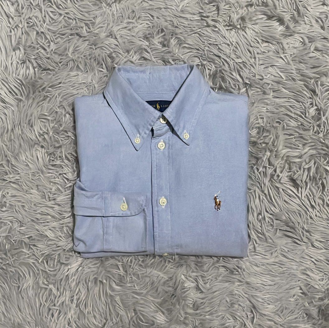 Ralph Lauren Custom Fit Oxford Multi Colored Pony Button Down Light Blue LS (Category: Tshirts & Polo Shirts ) located in Cebu City. Submitted by johnova18 (Listing ID 1469683684, Image 1). Description: Ralph Lauren Custom Fit Oxford Multi Colored Pony Button Down Light Blue LS Authentic ✅ Size: XS Width: 16.5 Length: 26 Color rate: 10/10 Pristine condition Good As New 3800 + shipping fee Location: Cebu City.
