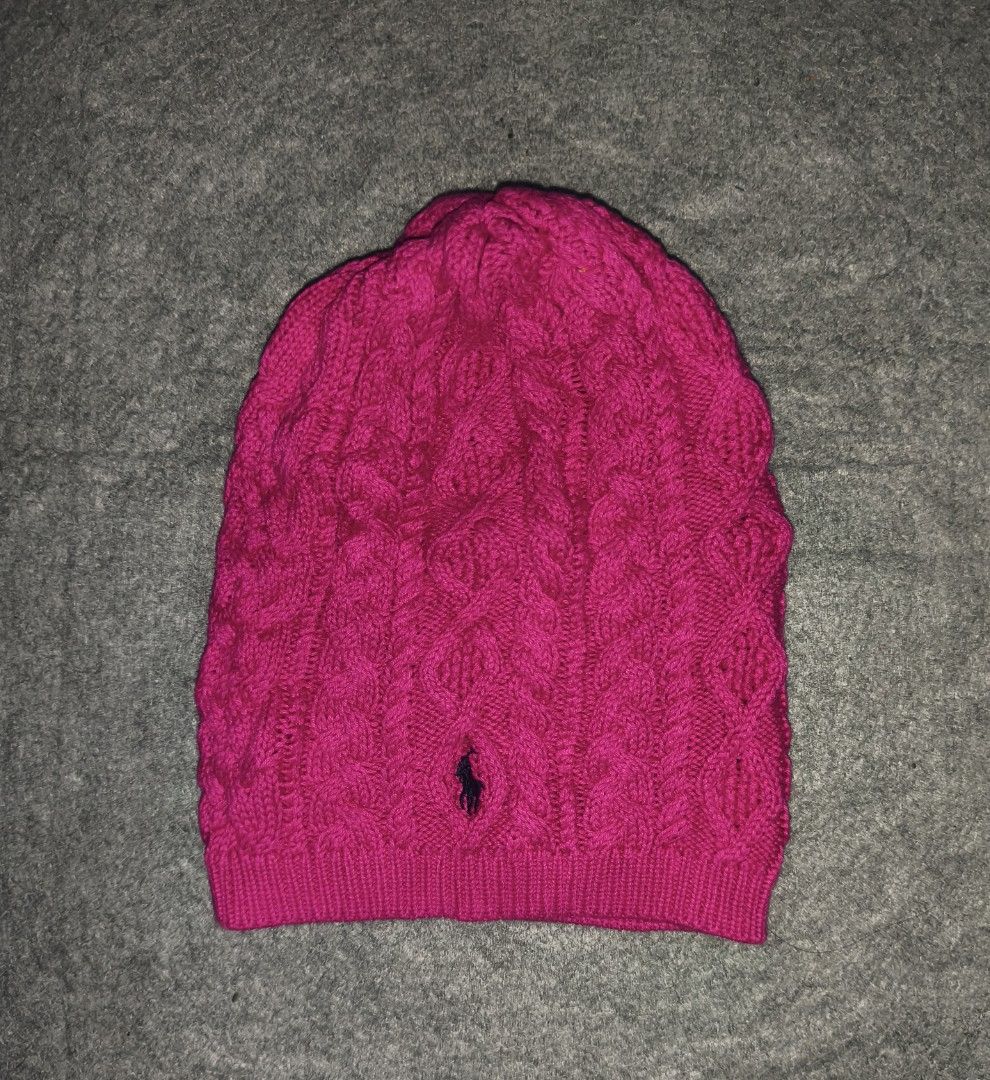Ralph Lauren Pink Cable Knit Beanie (Category: Hats & Beanies) located in Cagayan de Oro. Submitted by adamfitz (Listing ID 1469644811, Image 1). Description: - Brand: Ralph Lauren - Color: Vibrant pink with classic black embroidered pony logo - Material: 100% soft cotton with a textured cable knit weave - Design: Folded ribbed cuff for a cozy fit - Condition: Great winter accessory, style number 313510369 included on interior tag excellent no is