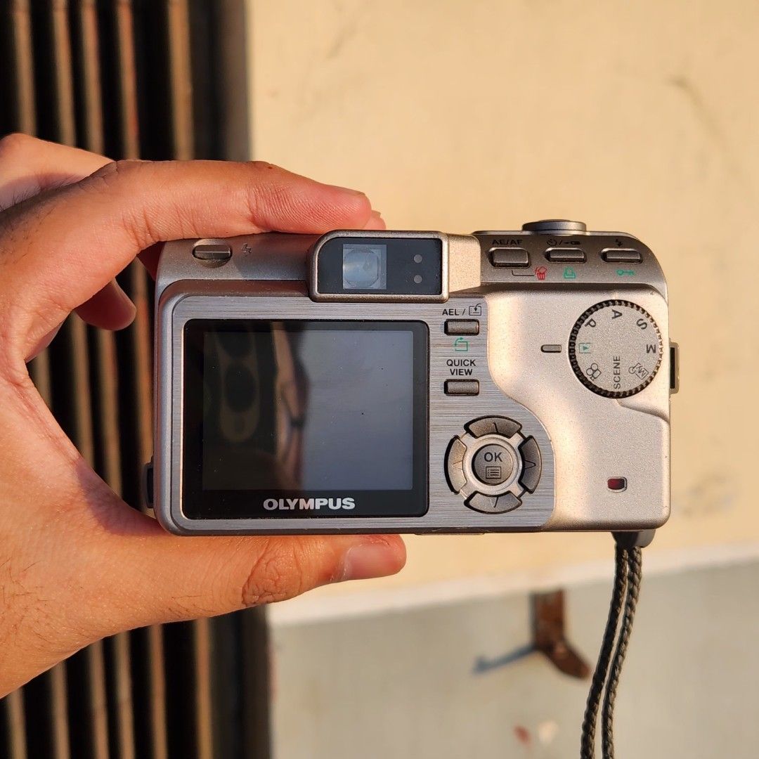 RARE OLYMPUS C-70 / C-7000 DIGITAL CAMERA (Category: Cameras) located in Bulacan. Submitted by h3nrpny (Listing ID 1469753207, Image 2). Description: RARE OLYMPUS C-70 / C-7000 DIGITAL CAMERA Released in 2004 | 7.1MP CCD | 5x Optical Zoom Features: RAW Shooting, Pop-up Flash Condition: Clean unit, no issues Inclusions: 2 Batteries, xD Card, Original Charger, Camera Pouch Location: Malabon / Bulacan.