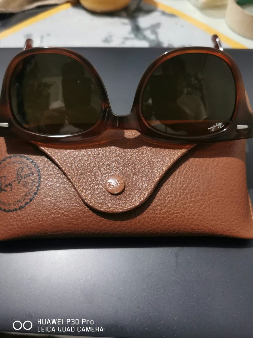 Ray-Ban Meteor (Category: Sunglasses & Eyewear) located in Makati City. Submitted by relianzmae57131 (Listing ID 1469697721, Image 2). Description: - Brand: Ray-Ban ideal for big or wide faces - Style: Classic Wayfarer - Frame: signature temple branding - Lenses: Dark tinted with top corner logo - Inclusion: Original brown leather case with snap button closure and embossed logo - Condition: Excellent / Well-maintained - Mode of Payment: BPI / GCa