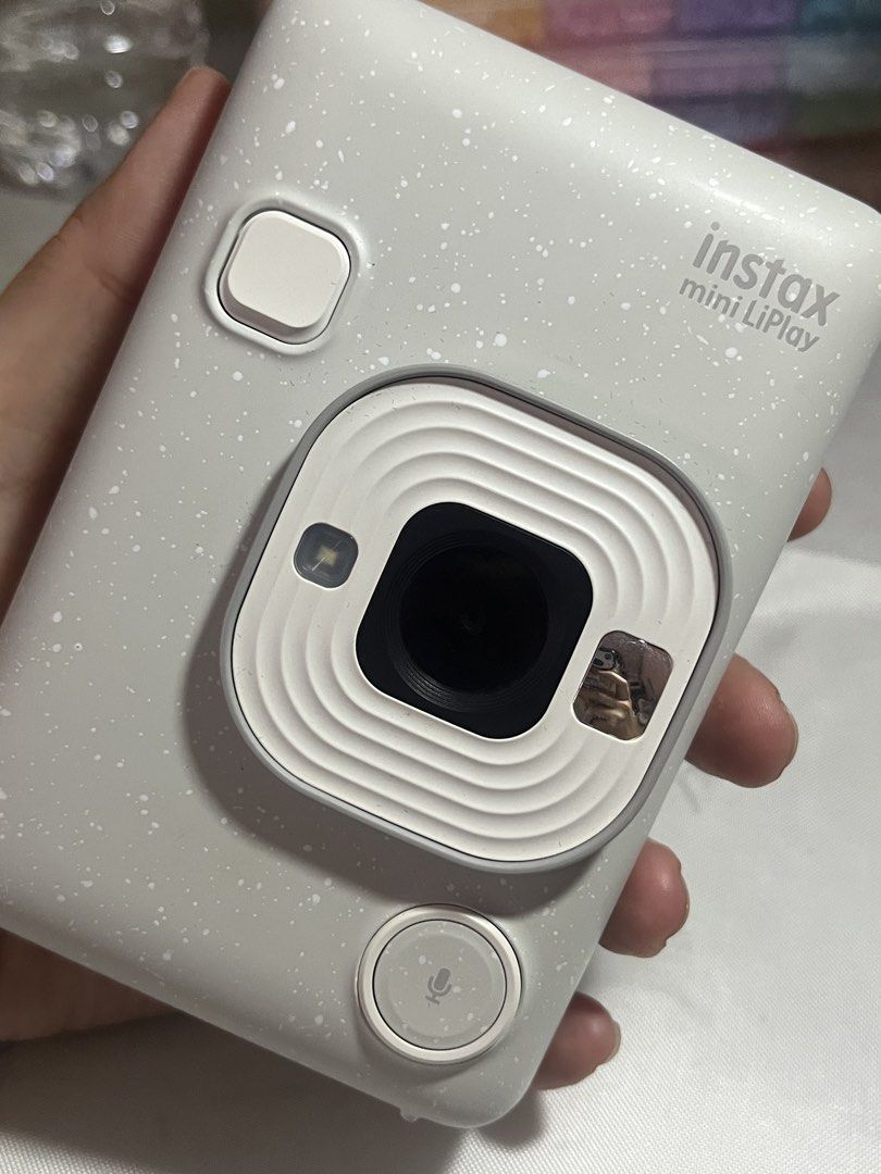 READ DISCLAIMER: Instax Mini LiPlay in Misty White (With Issues) (Category: Cameras) located in Malabon City. Submitted by trishamaeramirez (Listing ID 1469602003, Image 1). Description: READ DISCLAIMER: Instax Mini LiPlay in Misty White (With Issues) ₱2,000 (Negotiable rate if will pay and claim the item today 10/22) Issue: Hardware issue due to long storage, prints black film only. (₱3,500 labor fee for repair) See photo for reference. Other th