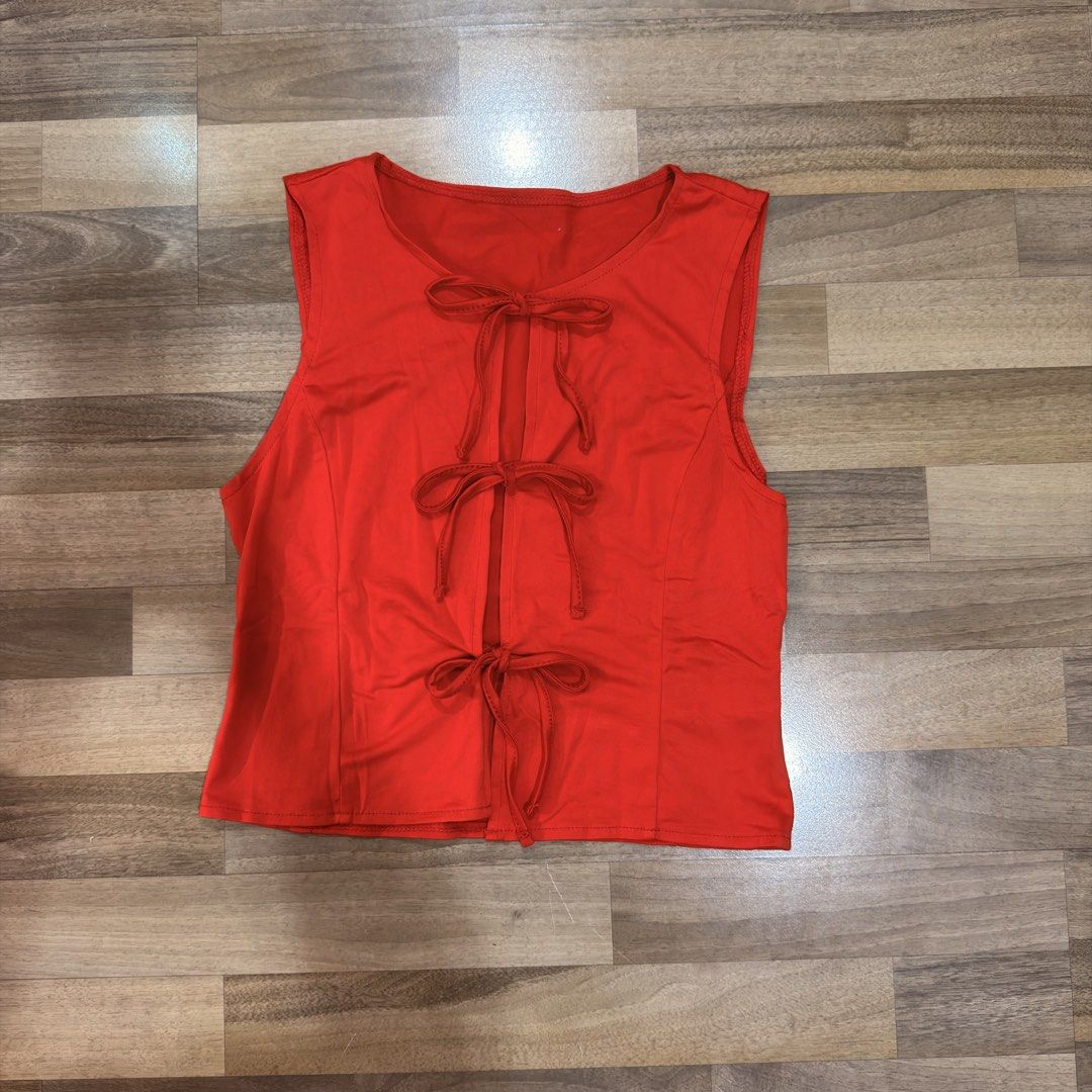 Red Tank Top with Front Ties (Category: Sleeveless) located in Pasig City. Submitted by katricem (Listing ID 1469605301, Image 1). Description: Red Tank Top with Front Ties size L on tag, best fits s-m worn once for themed outfit rfs: not my style, decluttering last price listed ‼️ percentage discount automatically applied if buying multiple items from my page☺️ 💸 MOP: gcash, maya, bpi 📦 MOD: sdd (buyer booking), LBC, meetup SF c/o buyer, rates
