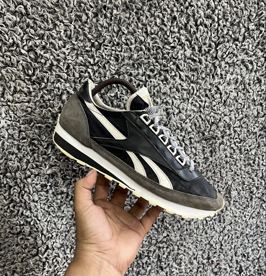 Reebok Classic Aztec | Size 8.5 mens (Category: Sneakers) located in General Trias. Submitted by zrchustle.604 (Listing ID 1469757505, Image 1). Description: Reebok Classic Aztec, an archival running model celebrated for its lightweight retro silhouette. Key Design Features • Colorway: Core black textile upper accented with off-white or cream vector stripes. • Material Mix: Built with a nylon and textile base layered alongside textured dark grey 