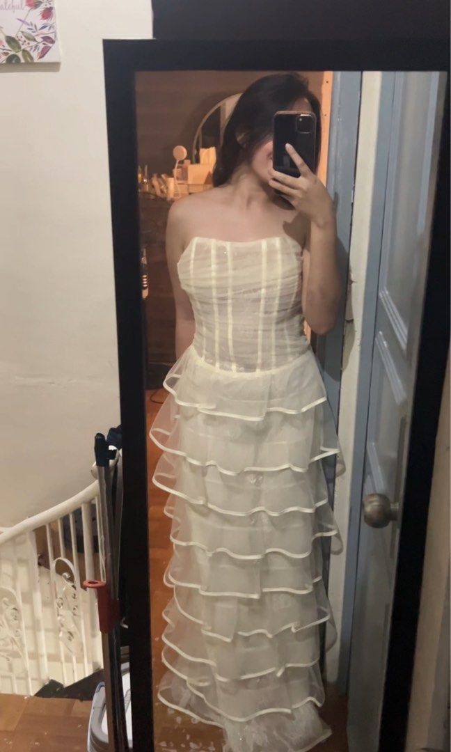 RENT: Cream Ruffle Dress (Category: Dresses) located in Manila. Submitted by nicole.lcn (Listing ID 1469553162, Image 3). Description: 600/ 2 days rent + 100 for Filipiniana Sleeves Loc: Las Piñas City Color: Cream Size: Small Length: 116cm | 45 inches Waist: 68cm | 26 inches Bust: 76cm | 29-30 inches Epbi: nicole (dp same as here) .