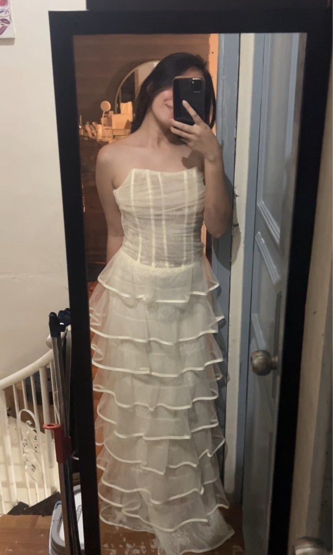 RENT: Cream Ruffle Dress (Category: Dresses) located in Manila. Submitted by nicole.lcn (Listing ID 1469553162, Image 1). Description: 600/ 2 days rent + 100 for Filipiniana Sleeves Loc: Las Piñas City Color: Cream Size: Small Length: 116cm | 45 inches Waist: 68cm | 26 inches Bust: 76cm | 29-30 inches Epbi: nicole (dp same as here) .