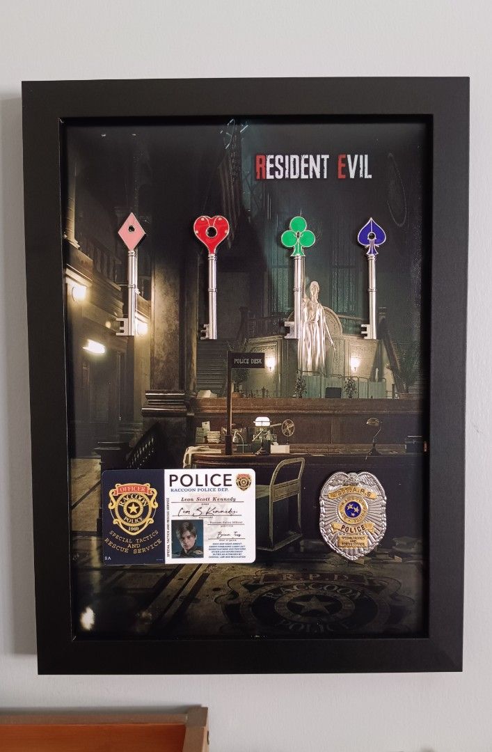 Resident Evil RPD Art frame (A4 size) (Category: Other Merchandise) located in Manila. Submitted by Drumsticx (Listing ID 1469676454, Image 1). Description: Resident Evil RPD Art frame (A4 size) - RPD Metal keys - Leon Kennedy ID (PVC) - STARS Metal Badge Price: 1600php Manila Location.