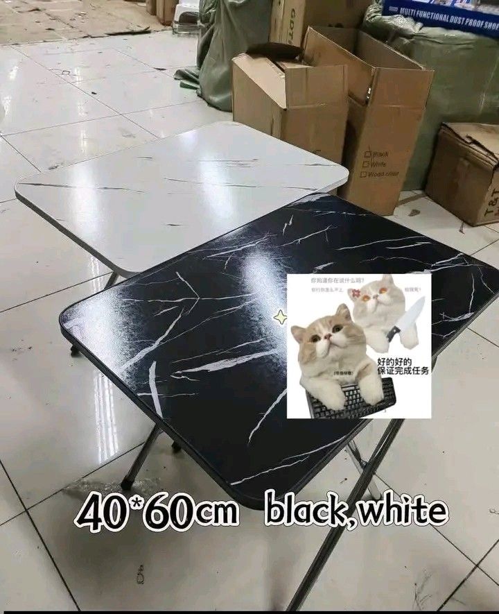 Restock 40*60cm table ️ black，white (Category: Tables & Sets) located in Manila. Submitted by vanstar_c4c231 (Listing ID 1469689124, Image 2). Description: Restock ! ! ! 40*60cm table ️ black，white pm for the order cod via lalamove.