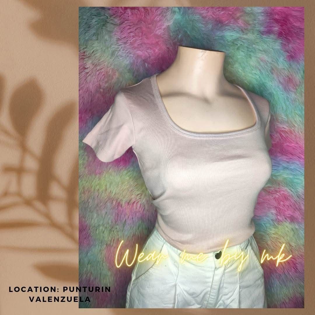 Ribbed Short Sleeve Crop Top Assorted Colors (Category: Shirts) located in San Jose del Monte. Submitted by vakadela54883 (Listing ID 1469640664, Image 1). Description: - Colors available: Pastel pink, black, and olive green - Design: Square neck and polo collar options with a fitted silhouette - Fabric: Soft, stretchy material that hugs the body nicely - Versatility: Great basic pieces for casual everyday outfits, easy to pair with high-waisted 