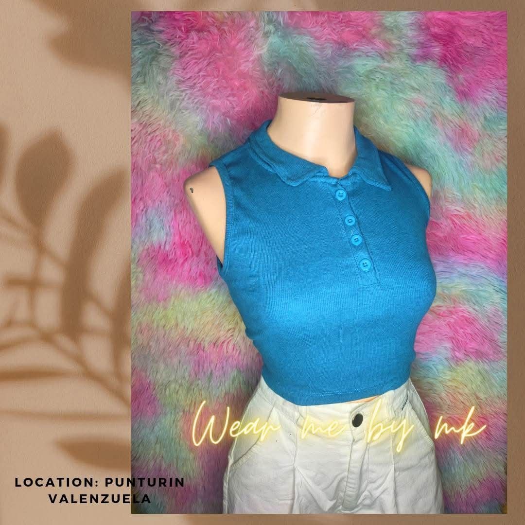 Ribbed Short Sleeve Crop Top Set (Category: Shirts) located in San Jose del Monte. Submitted by vakadela54883 (Listing ID 1469640510, Image 3). Description: - Bundle of 3 versatile crop tops - Colors: White (scoop neck), royal blue (scoop neck), and turquoise (button polo) - Fabric: Ribbed, stretchy, and super comfortable - Design: Short sleeves on scoop necks, sleeveless on the button polo - Perfect basic pieces for casual everyday wear - Locati