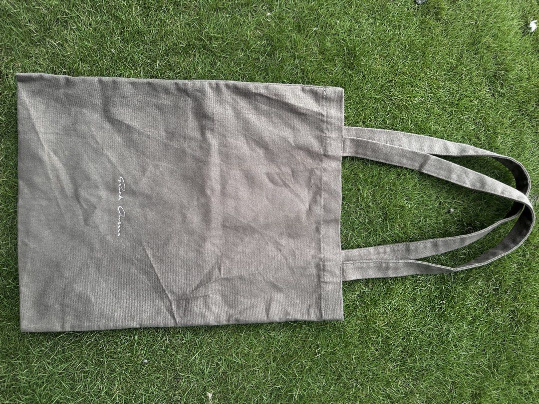RICK OWENS TOTE BAG NEEDS CLEANING SEE PHOTOS FOR REFERENCE (Category: Tote Bags) located in Tacurong. Submitted by locationtacurongcitymindanao (Listing ID 1469682132, Image 2). Description: RICK OWENS BROWN TOTE BAG EMBROIDERED LOGO 18.5X14.5 May discoloration see photos .