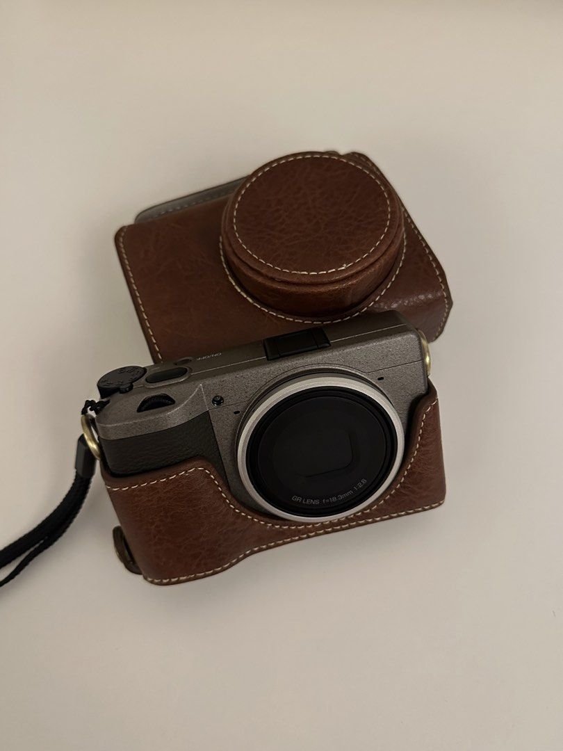 Ricoh GR III Diary Edition (Category: Cameras) located in Cebu City. Submitted by tshamae (Listing ID 1469703320, Image 1). Description: ❗️Ricoh GR III Diary Edition❗️ - very good condition - clean lens - no issues - sc: 6500+ - very pocketable - check all u want Inclusions: - with orig box and the orig inclusions (type c cable, wrist strap, ring caps) - 1 orig battery - 2 durapro batteries - 1 durapro charger - leather case - GR lens cap.