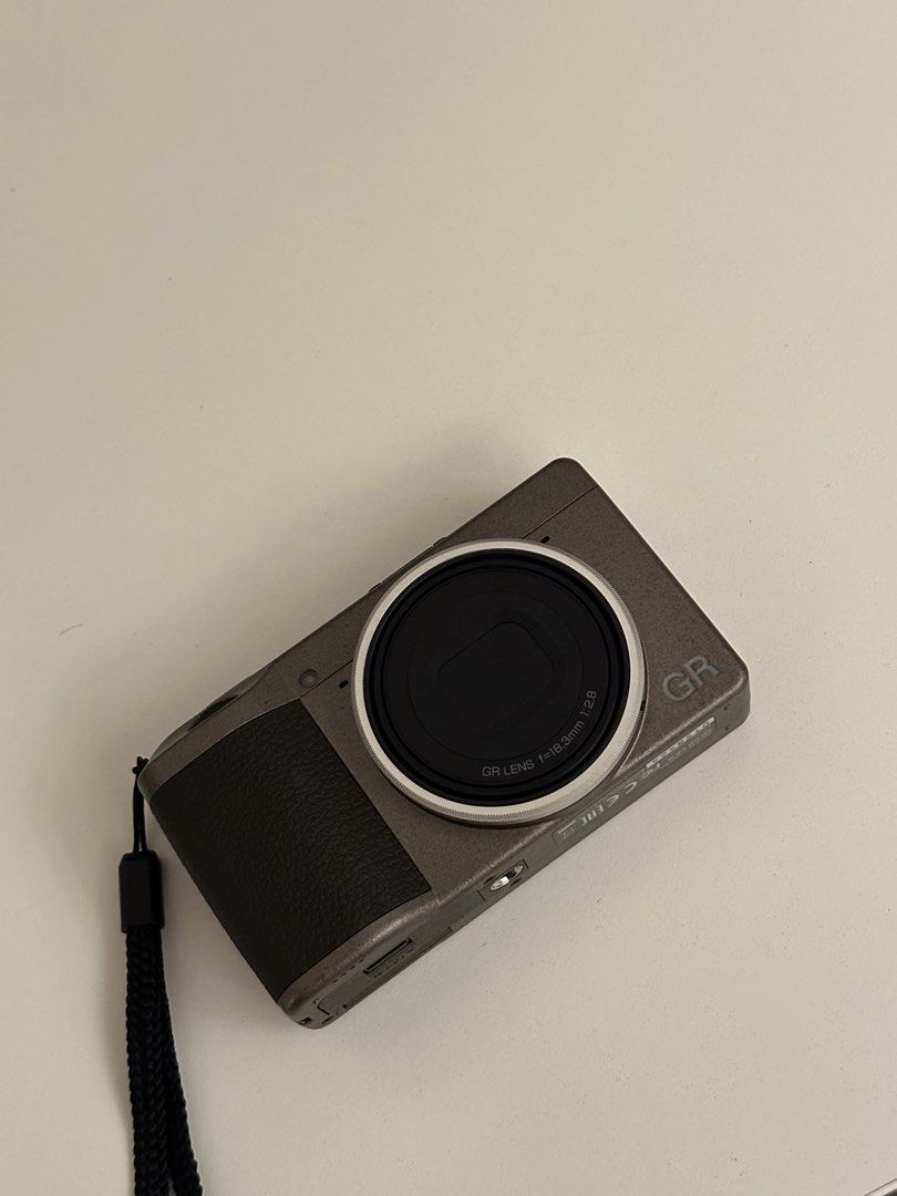 Ricoh GR III Diary Edition (Category: Cameras) located in Cebu City. Submitted by tshamae (Listing ID 1469703320, Image 2). Description: ❗️Ricoh GR III Diary Edition❗️ - very good condition - clean lens - no issues - sc: 6500+ - very pocketable - check all u want Inclusions: - with orig box and the orig inclusions (type c cable, wrist strap, ring caps) - 1 orig battery - 2 durapro batteries - 1 durapro charger - leather case - GR lens cap.