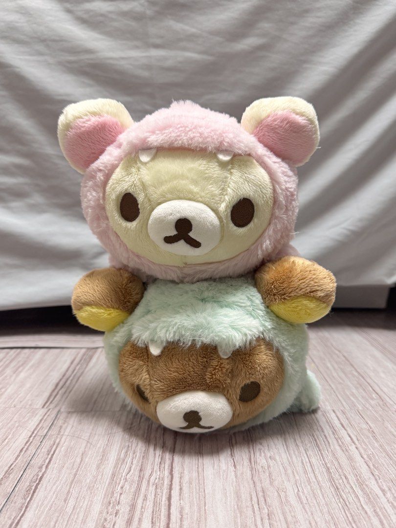 Rilakkuma Dinosaur Set (Category: Plushies & Soft Toys) located in Iguig. Submitted by gtonsukiex (Listing ID 1469603453, Image 1). Description: - Authentic San-X stacked plushies (Korilakkuma and brown bear) - Features fluffy pink and mint green monster hoodies with cute teeth details - Made from super soft and cuddly plush material - Clean, fluffy condition, ideal for collectors and display - Perfect gift for Rilakkuma fans.