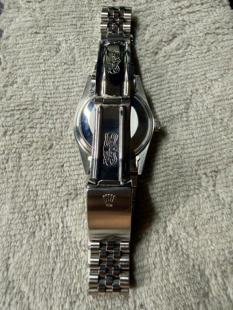 Rolex Oyster Perpetual Datejust Watch (Category: Luxury Watches) located in Pasig City. Submitted by mamasboyforlife (Listing ID 1469587264, Image 3). Description: - Authentic Rolex Oyster Perpetual Datejust - Iconic silver linen dial with date window and cyclops lens - 18k white gold fluted bezel - Comfortable stainless steel jubilee bracelet with Rolex coronet clasp - Classic vintage aesthetic, perfect for daily wear or formal occasions - Guara