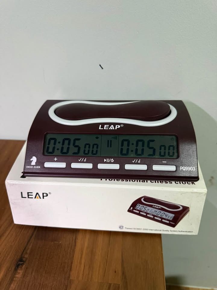 Roll-up Chess Set with LEAP Chess Clock (Model PQ9903A) (Category: Board Games & Puzzles) located in Cainta. Submitted by kenpates (Listing ID 1468968913, Image 2). Description: Roll-up Chess Set with LEAP Chess Clock (Model PQ9903A) PHP 1,250 (Selling as a set only) - LEAP Chess Clock is fully working. PM me if you want a video of it working. - Extra White and Black Queen - No issues whatsoever. Needs a little bit of cleaning lang. RFS: Declutte