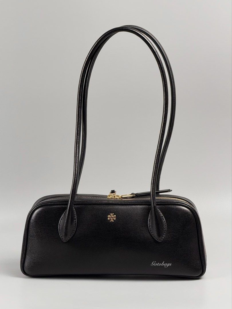Rory Eastwest Shoulder Bag (Category: Shoulder Bags) located in Angeles City. Submitted by gobagsto (Listing ID 1469614911, Image 1). Description: Black textured leather body with gold tone hardware. Long double shoulder straps, top zip closure. Inside has fabric lining and slip pockets. Dimensions measure 11 inches long, 4.5 inches high, and 2 inches deep. Clean interior and exterior, no major scuffs or marks anywhere..