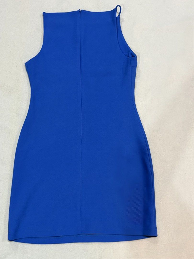 Royal Blue Sleeveless Mini Dress chic (Category: Dresses) located in Noveleta. Submitted by kix.declutters (Listing ID 1469675334, Image 2). Description: 🩰 Color: Bright Royal Blue 🩰 Style: Sleeveless mini dress with a sleek high neckline 🩰 Fit: Form-fitting silhouette, hits above the knee 🩰 Details: Clean front and back design with a center-back zipper closure 🩰semi stretchy thick fabric mod: jnt mop: gcash (PAYO) loc: noveleta, cavite.