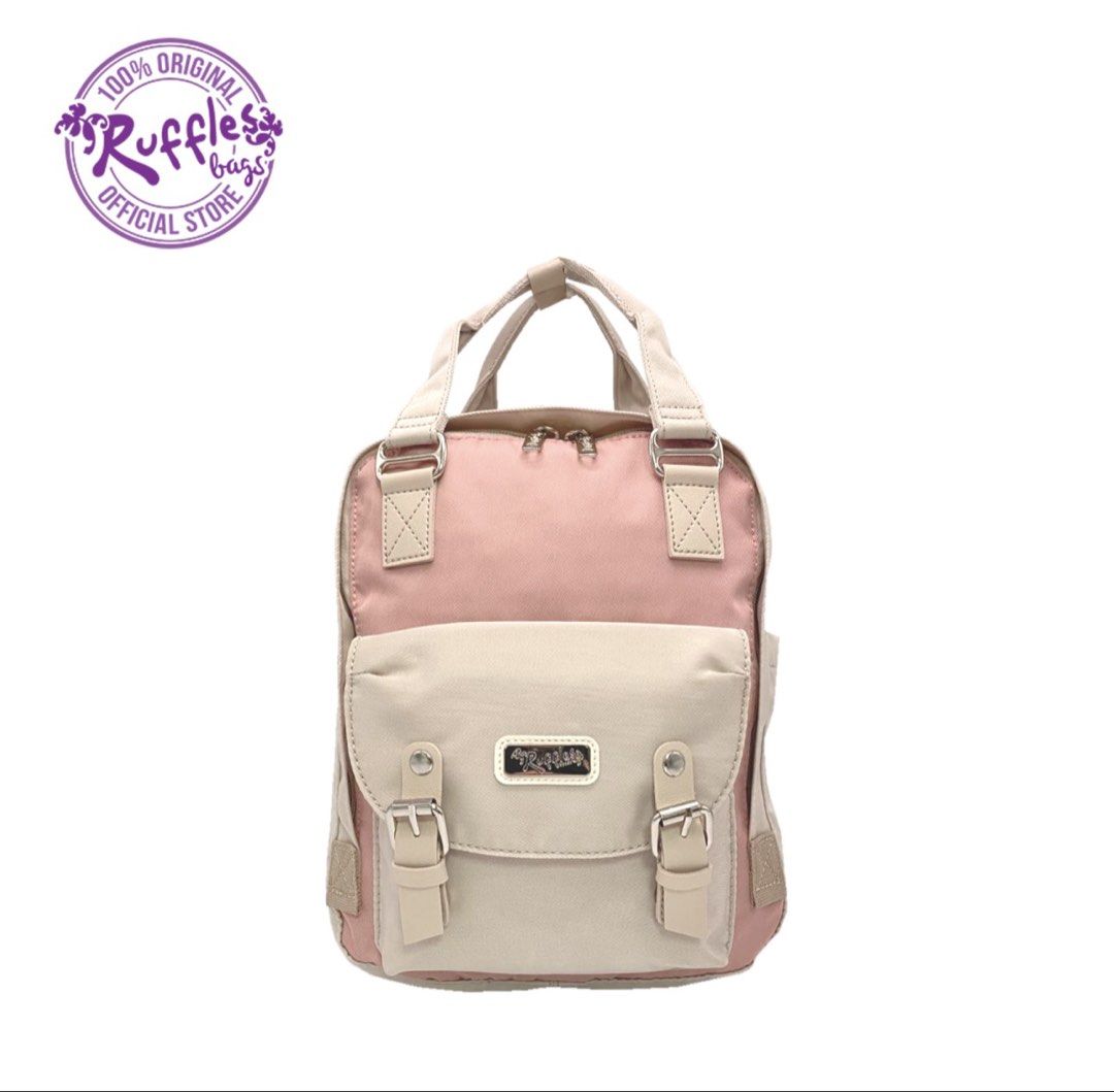 Ruffles Bags Two-Tone Pink and Beige Mini Backpack (Category: Backpacks) located in Manila. Submitted by edgiedge (Listing ID 1469648544, Image 3). Description: - Brand: Ruffles Bags - Color: Pink and Beige ₱200.