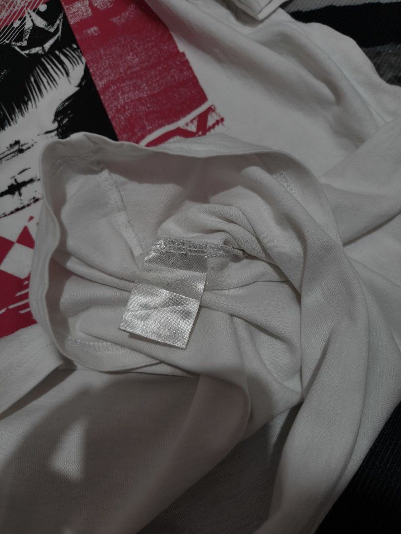 Rusty White Graphic Tee Surf Skate Streetwear (Category: Tshirts & Polo Shirts ) located in Andop. Submitted by kyutoryuu (Listing ID 1469582014, Image 3). Description: Rusty Graphic Tee •Dimes: 19x27 •Condition: Excellent •CR: 9.5/10 •Issue: need rewash.