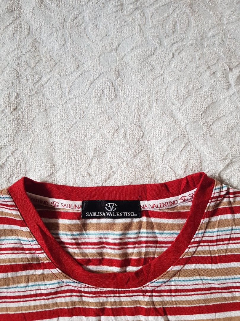 Sablina Valentino T Shirt (Category: Luxury Apparel) located in Santo Domingo. Submitted by jcobedoza213916 (Listing ID 1469576715, Image 3). Description: Sablina Valentino T Shirt Women's Width 19 Lenght 22-23 chest Embroid logo sablina valentino Wash Tag JAPAN stretchable size on tag MEDIUM excellent condition color rate 10/10 goods as a new no issue.