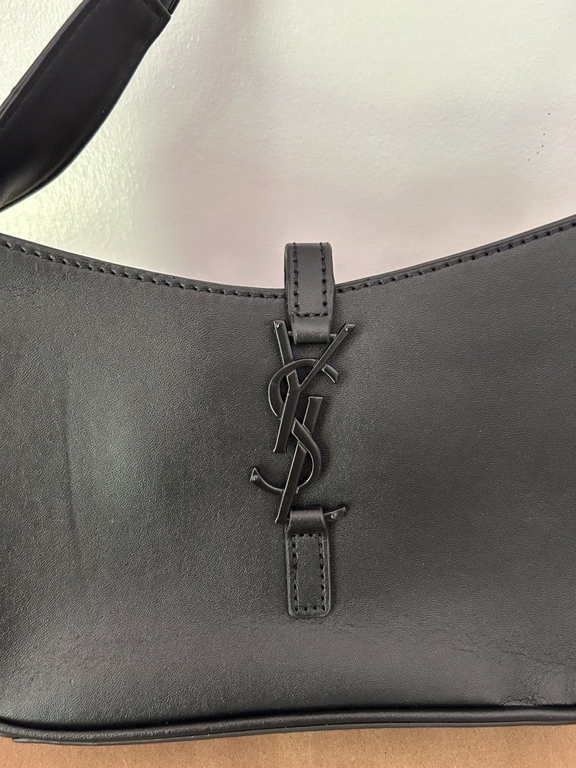 Saint Laurent Black Leather Shoulder Bag (Category: Luxury Bags & Wallets) located in Legazpi City. Submitted by jjacob_018 (Listing ID 1469681899, Image 3). Description: - Saint Laurent shoulder bag in classic black leather - Iconic metal monogram hardware on front center loop closure - Adjustable strap with metal buckle for custom fit - Clean structure with stylish tonal edge stitching - Spacious daily carry size for essentials .
