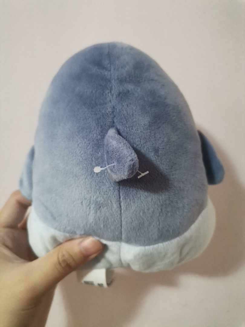 Samezu Shark Plush Toy (Category: Plushies & Soft Toys) located in Makati City. Submitted by kookybearsstuff (Listing ID 1469649986, Image 2). Description: - Authentic Samezu shark plushie by Clever Idiots - Made of soft blue plush material with stitched white teeth and wide open mouth - Original tags attached on the side and back - Clean fabric with no stains, flaws, or damage - Perfect collectible item for fans and plushie collectors - From a s