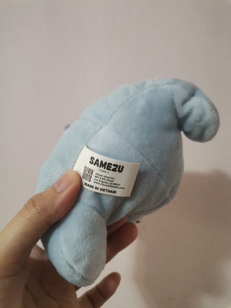 Samezu Shark Plush Toy (Category: Plushies & Soft Toys) located in Makati City. Submitted by kookybearsstuff (Listing ID 1469649986, Image 3). Description: - Authentic Samezu shark plushie by Clever Idiots - Made of soft blue plush material with stitched white teeth and wide open mouth - Original tags attached on the side and back - Clean fabric with no stains, flaws, or damage - Perfect collectible item for fans and plushie collectors - From a s