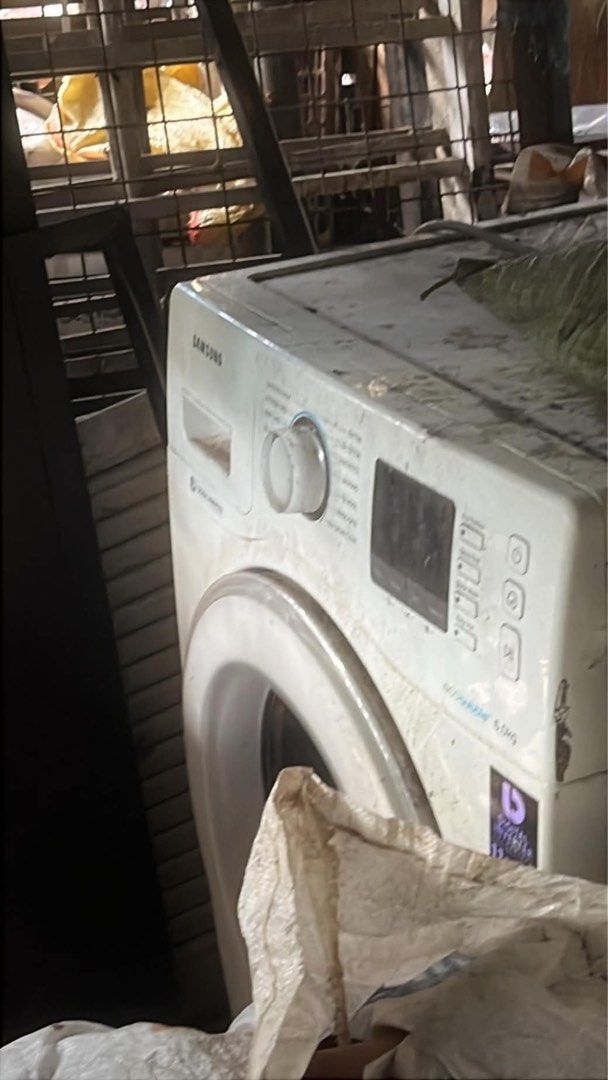 Samsung Front Load Washing Machine(stocked but never been use) (Category: Washing Machines and Dryers) located in Manila. Submitted by vioknecth (Listing ID 1469671674, Image 1). Description: - Brand/Model: Samsung front load washing machine - Features: Digital display panel with control dial - Condition: Dusty from storage, needs a good wipe down before use - Power: Standard power requirements - Logistics: Heavy appliance, self-collection requir
