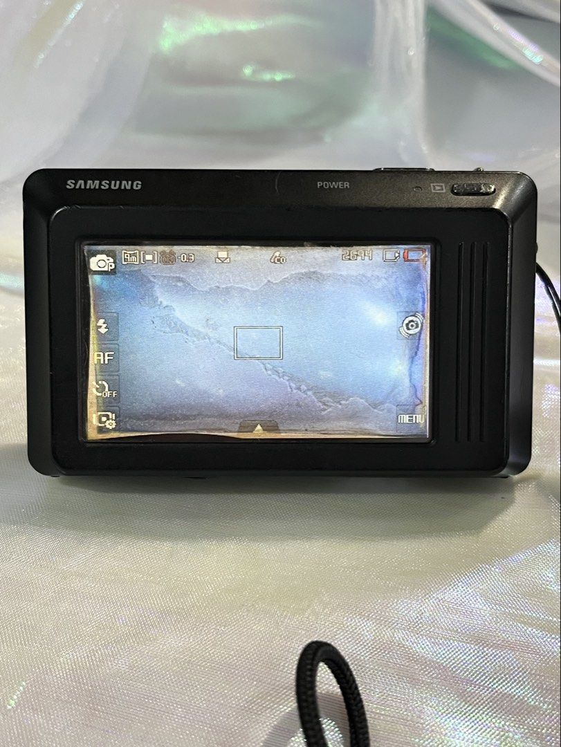 Samsung ST500 Digicam Digital Camera (Category: Cameras) located in Manila. Submitted by whooosshh (Listing ID 1469553156, Image 3). Description: ⸜❤︎⸝‍ samsung st500 digicam ⸜❤︎⸝‍ screen issue DOES NOT affect output ⸜❤︎⸝‍ inclusions: unit, battery, charger, sd card, strap ⸜❤︎⸝‍ front screen working .