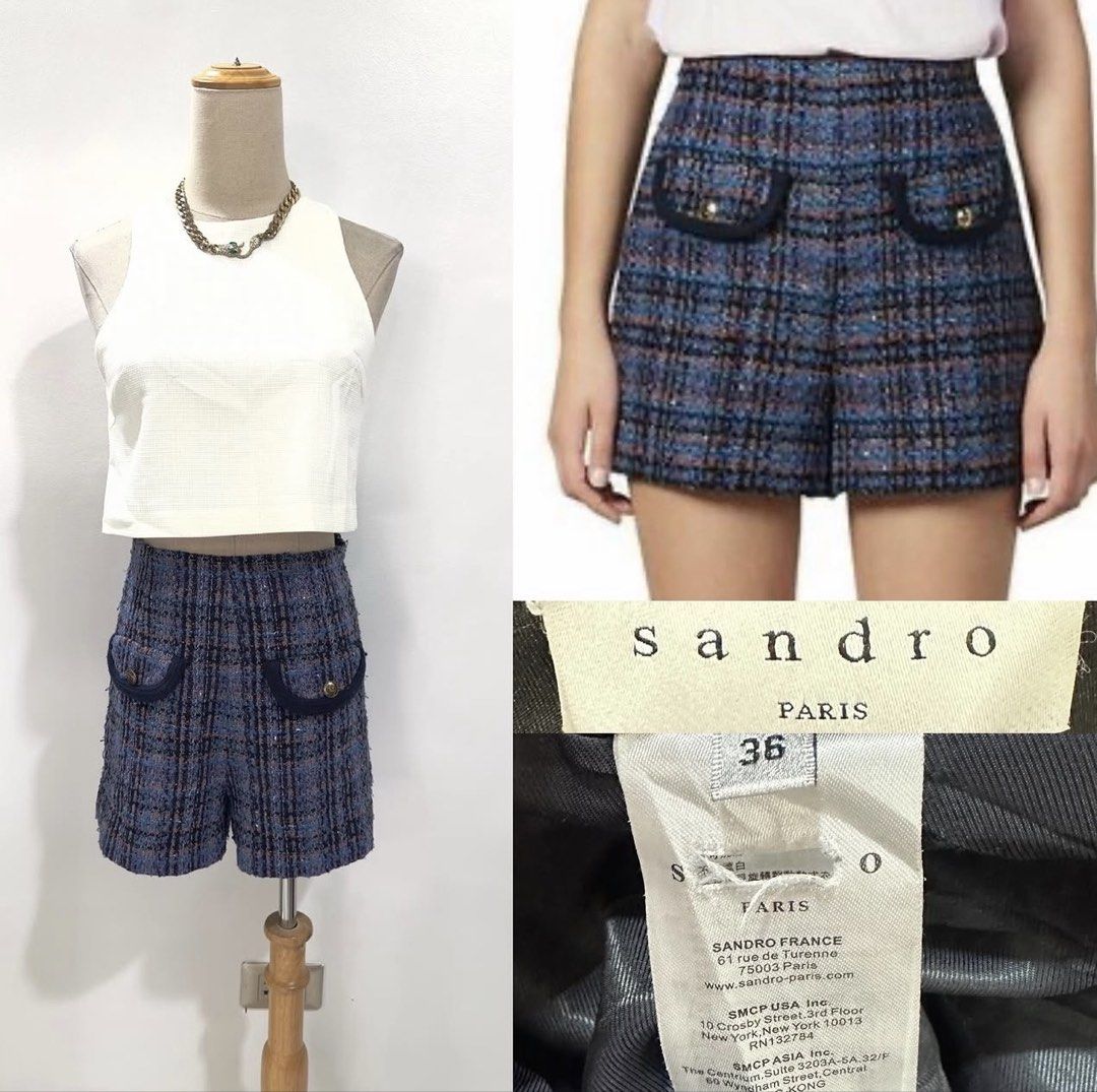 Sandro Paris Tweed Shorts Blue Size 36 (Category: Shorts) located in Bacolod City. Submitted by bhabissagal-05763 (Listing ID 1469595883, Image 1). Description: - Brand: Sandro Paris - Design: Blue, black, and brown plaid tweed pattern - Fit: High-waisted style, Size 36 - Details: Front welt pockets with dark trim and chic gold-tone buttons - Interior: Fully lined - Condition: Excellent, clean fabric with no flaws noticed.