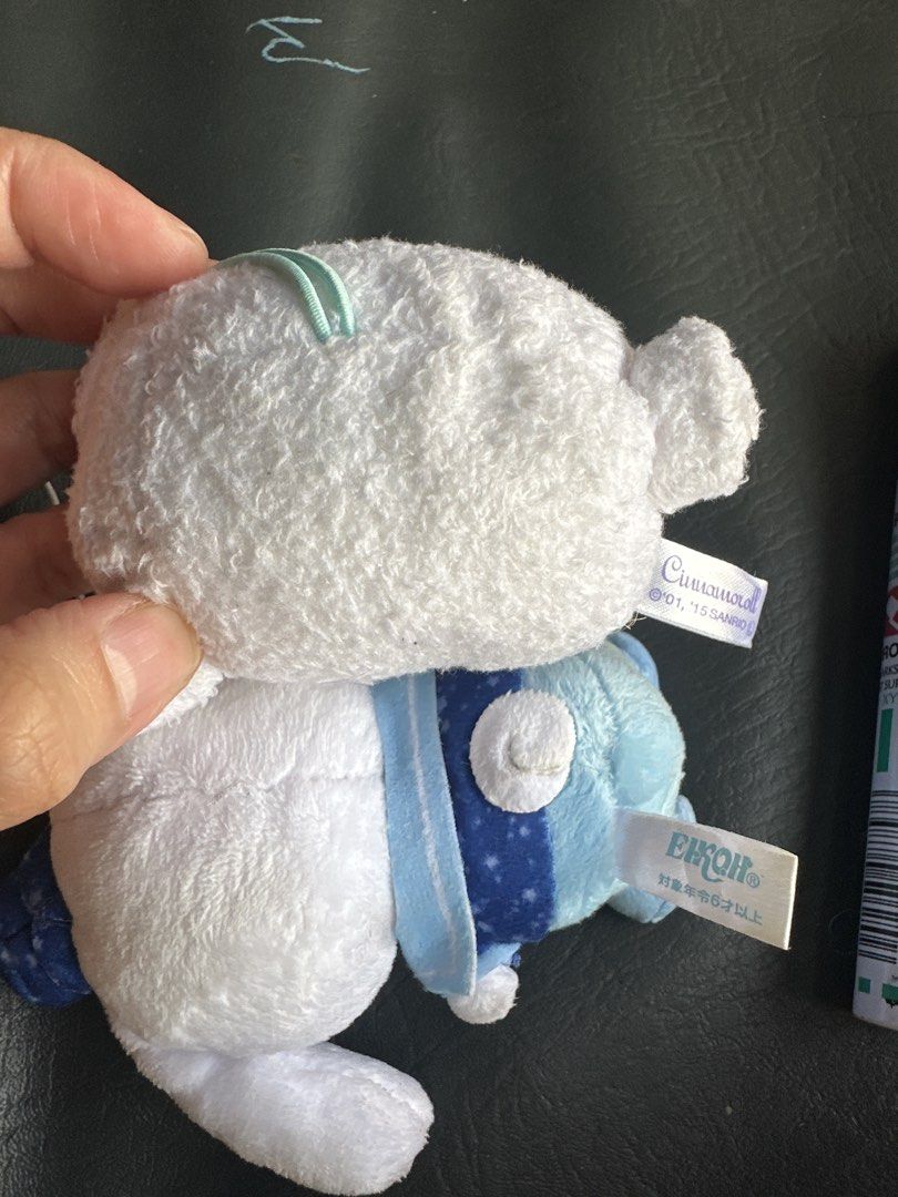Sanrio Cinnamoroll Bundle (Category: Plushies & Soft Toys) located in Cainta. Submitted by shopbyyna (Listing ID 1469640320, Image 2). Description: - Authentic Sanrio Cinnamoroll plush mascot - Wears an adorable blue starry sailor outfit with a matching hat and holds a wand - Bundle includes an extra Cinnamoroll head plush and a pink bunny character keychain with a big bow - Original Eikoh and Sanrio tags from 2001 and 2015 attached - Pilot marke