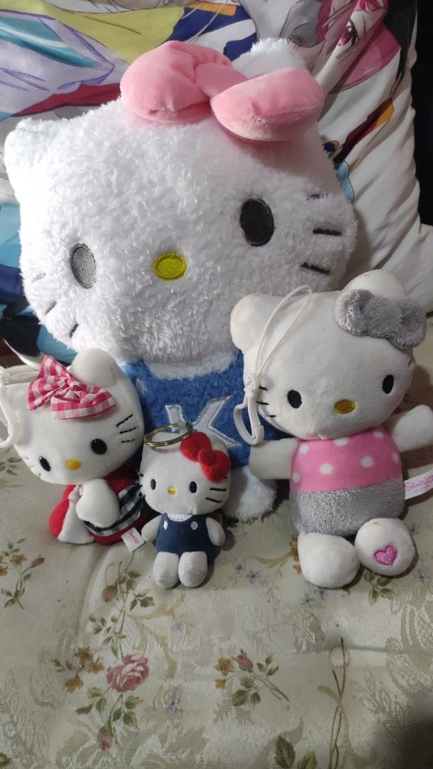 Sanrio Hello Kitty Plush Toy Collection Bundle (Category: Plushies & Soft Toys) located in Manila. Submitted by annetteasi22390 (Listing ID 1469629999, Image 1). Description: - Set of 5 Kitty plush toys and keychains - Includes 1 large plush (pink bow and blue overalls) and 4 smaller ones - Features various adorable outfits, dresses, and bows - Includes hanging straps on two pieces and a metal keyring on one - Clean fabric exterior on all items -