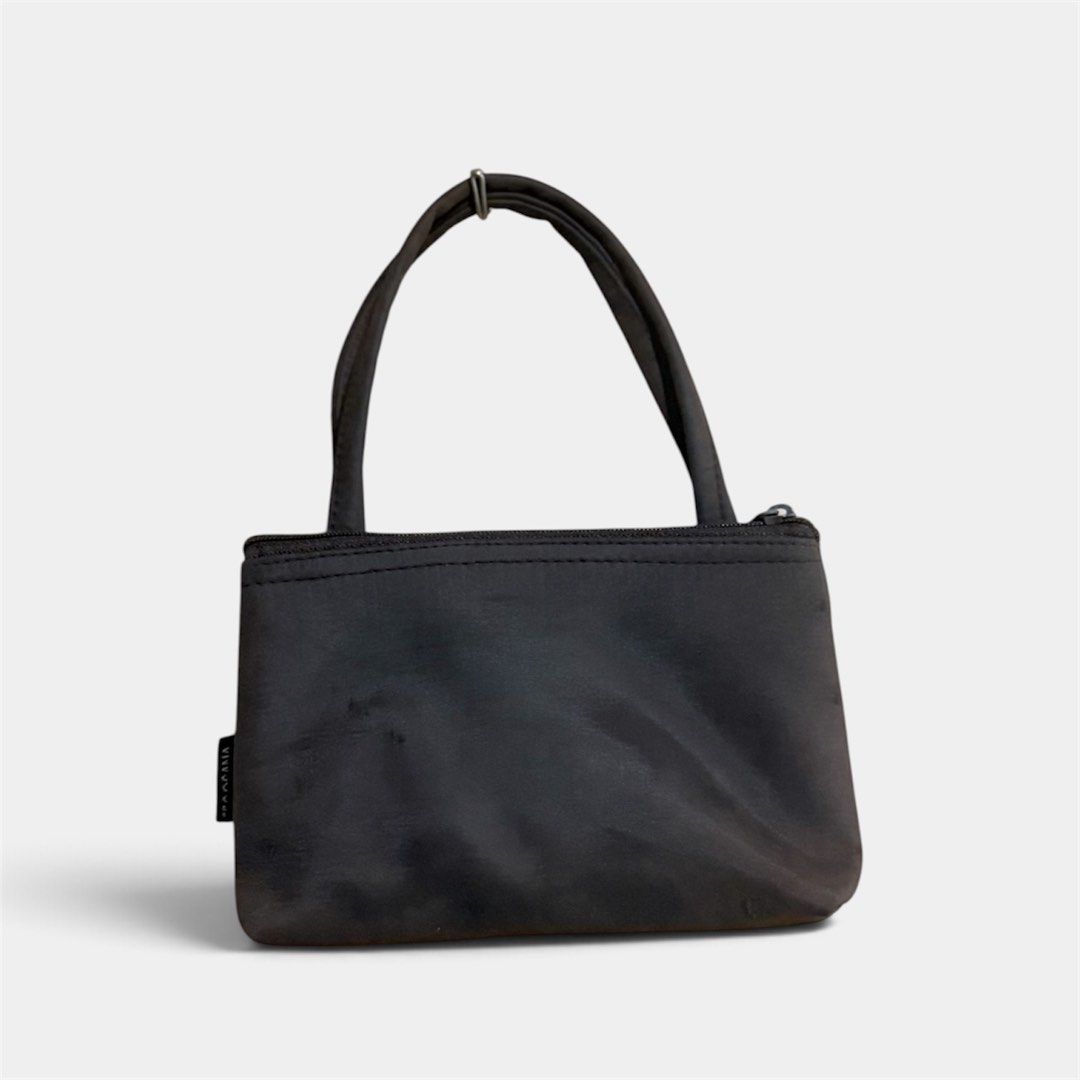 Secosana Brown Nylon Handbag with Dual Compartments (Category: Luxury Bags & Wallets) located in Manila. Submitted by only_alyssacloset (Listing ID 1469645692, Image 1). Description: Brand: Secosana Material: Durable brown nylon Compartments: Double zippered main compartments Size: Small.