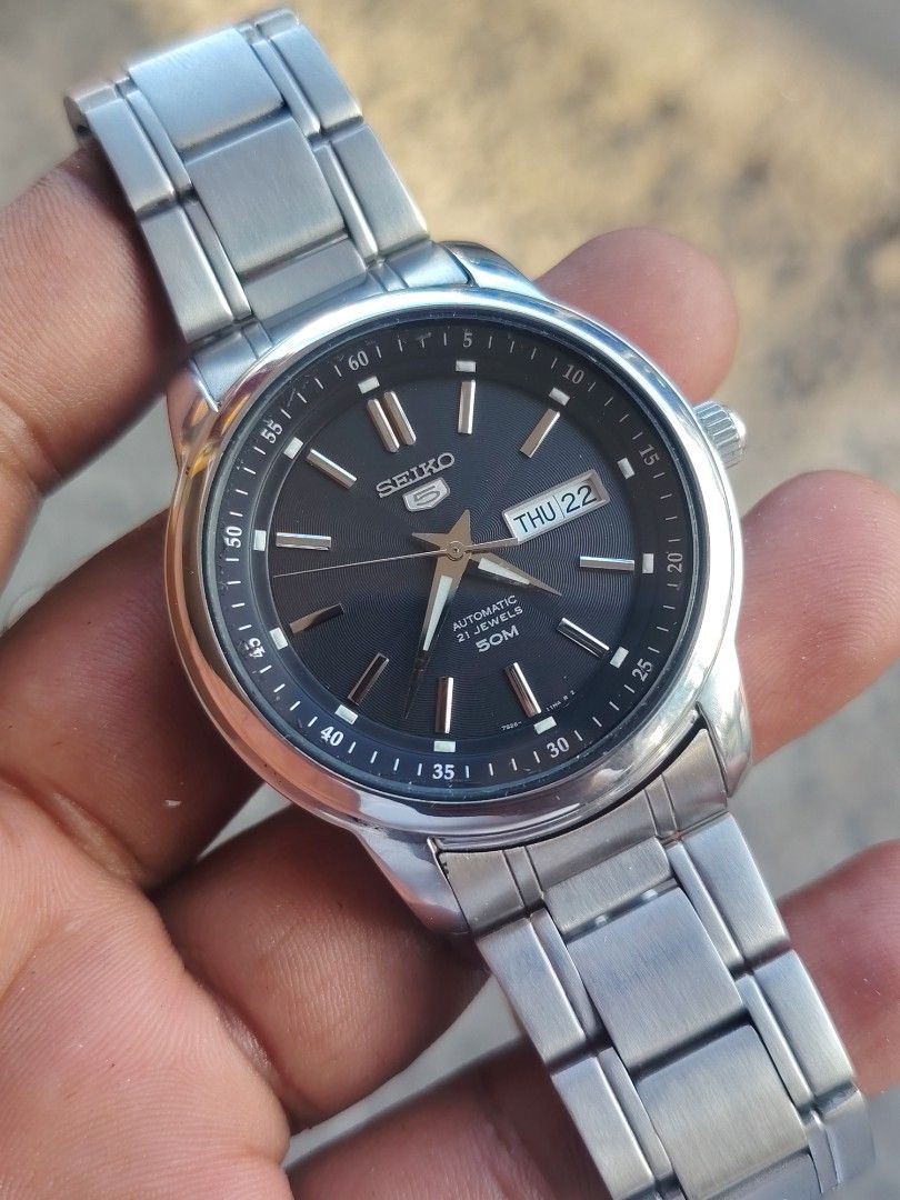 Seiko 5 Automatic 21 Jewels 43mm (Category: Men's Watches) located in Las Pinas. Submitted by mitchellestrada20202020 (Listing ID 1469651773, Image 1). Description: for sale.. seiko 5 mens automatic 43mm allsteel 9-10 condition water resistant 21 jewels snkm87k1 7s26--03z0 unit only good condition open for met up or lalamove handle buyer.