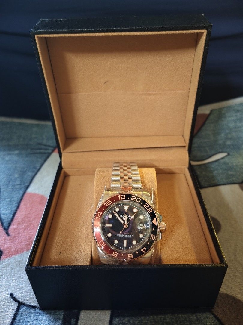 Seiko GMT Master II Mod Watch with Box automatic (Category: Luxury Watches) located in Manila. Submitted by rarewind.cb1244 (Listing ID 1469644523, Image 1). Description: - Brand new Seiko GMT Master II mod watch - Iconic black and red 'Coke' style bezel - Two-tone rose gold and steel jubilee bracelet - Black dial with circular hour markers and 3 o'clock date window - Powered by a reliable automatic movement with a solid build - Comes complete wi