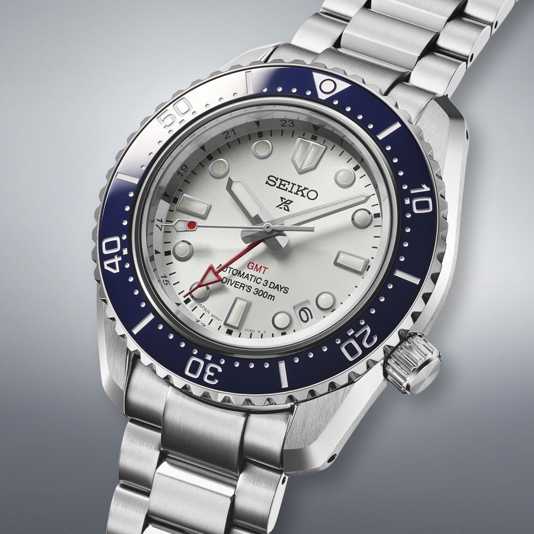 Seiko Marine Master 1968 Heritage SPB519J1 (Category: Men's Watches) located in Manila. Submitted by fletchd (Listing ID 1469737490, Image 3). Description: - Brand: Seiko Prospex GMT Automatic Watch - Dial: Silver sunburst dial with a prominent red GMT hand and date window - Bezel: Blue rotating bezel with white markers - Case & Bracelet: Durable stainless steel construction - Performance: Reliable automatic movement with an impressive 3-day powe
