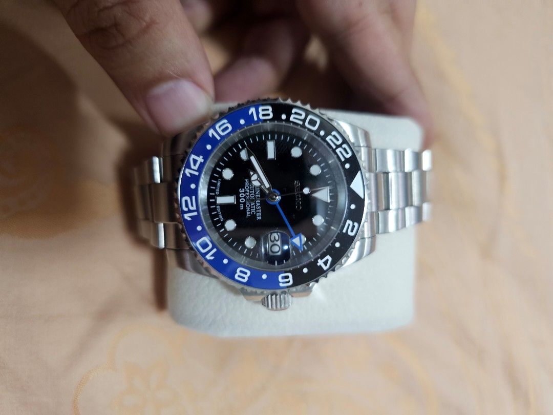Seiko Marinemaster Professional GMT Automatic Watch (Category: Men's Watches) located in Quezon City. Submitted by ryanstuff.ph (Listing ID 1469579817, Image 1). Description: - Model: Seiko Marinemaster Professional - Movement: Automatic - Water Resistance: 300m - Dial & Bezel: Black dial with a blue and black bezel - Bracelet: Steel oyster-style bracelet with deployment clasp - Features: Date window with magnifier, solid steel case back - Condit