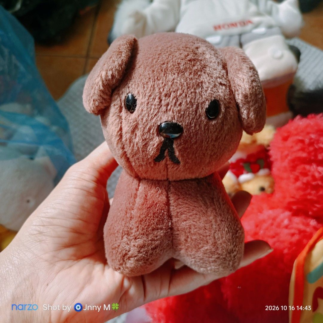 Sekiguchi Brown Puppy Plush Toy (Category: Plushies & Soft Toys) located in Taguig. Submitted by mhayestufftoys (Listing ID 1469589595, Image 1). Description: - Brand: Sekiguchi (Est. 1918) - Item: Palm-sized miniature brown puppy plush toy - Material: Soft fuzzy fabric with floppy ears - Details: Bead eyes and embroidered nose/mouth - Condition: Clean tag attached - Perfect for: Collectors and gift-giving.