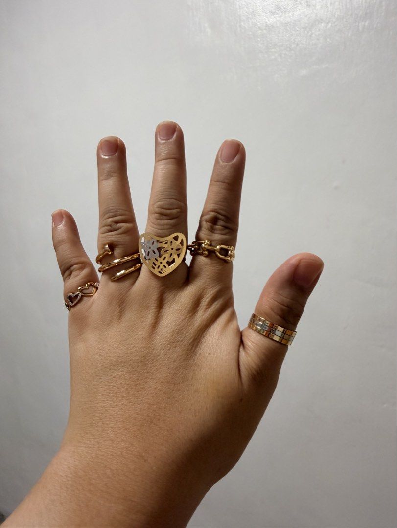 Selling my preloved 18k gold (Category: Rings) located in Quezon City. Submitted by mamamars1987 (Listing ID 1469634461, Image 3). Description: Im Size 8 18k gold rings 100% pawnable Letting them go for ₱7k/g only 1g-4g weight.