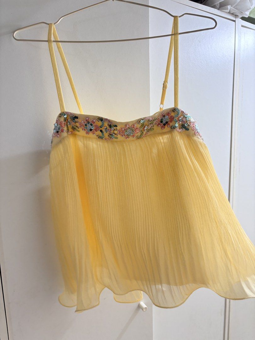 September BKK Yellow beaded top (Category: Sleeveless) located in Quezon City. Submitted by _jennkyle10 (Listing ID 1469670415, Image 1). Description: Used once only Free size Adjustable straps Rfs: Prefer other color .