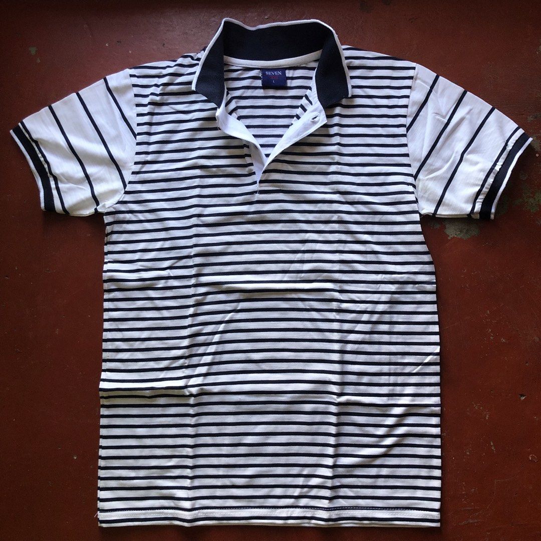 SEVEN JEANS Striped Polo (Category: Tshirts & Polo Shirts ) located in Manila. Submitted by dopethrift.cat (Listing ID 1469610722, Image 1). Description: Dimesion: Inches Width: 18" Length: 26" Sleeve: 8" Mop: gcash Ship: Lalamove or Jnt - Brand: SEVEN JEANS - Style: Striped polo shirt - Color: White and navy blue - Size: Large - Fit: Standard fit - Details: Short sleeves, contrasting dark collar and placket, lightweight fabric with horizontal st