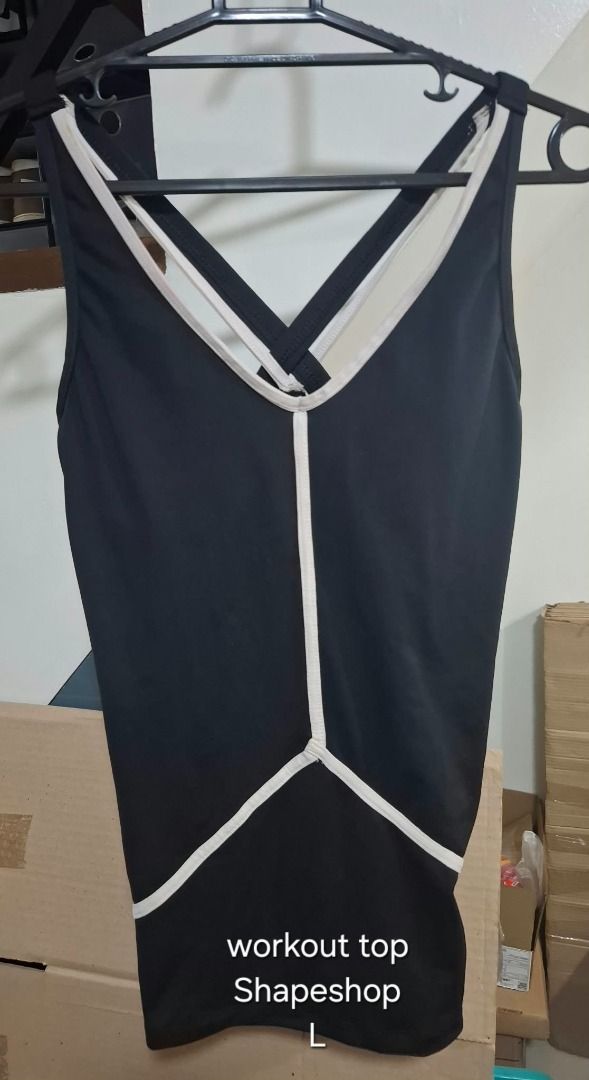 SHAPESHOP Black Workout Tank (Category: Activewear) located in Pasig City. Submitted by dripcounty (Listing ID 1469686138, Image 1). Description: SHAPESHOP Black Workout Tank ₱180 Bought in the Philippines Size: Large Condition: Good / preloved Black workout tank with contrast white piping. Actual item shown in photos. Delivery fee shouldered by buyer (Lalamove / other courier). Item price excludes delivery. Payment via cash / GCash / bank transf