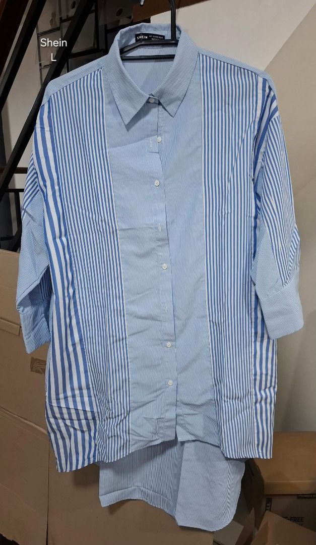 SHEIN Blue Striped Button Shirt (Category: Longsleeves) located in Pasig City. Submitted by dripcounty (Listing ID 1469689831, Image 1). Description: SHEIN Blue Striped Button Shirt ₱180 Bought in the Philippines Size: Large Condition: Good / preloved Blue and white mixed-stripe long sleeve shirt with button front and longer back hem. Actual item shown in photos. Delivery fee shouldered by buyer (Lalamove / other courier). Item price excludes del