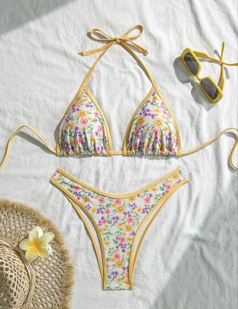 Shein Floral Triangle Bikini Set with Yellow Trim (Category: Bikinis & Swimsuits) located in Cainta. Submitted by lovecalluengg (Listing ID 1469600072, Image 1). Description: Used once only.
