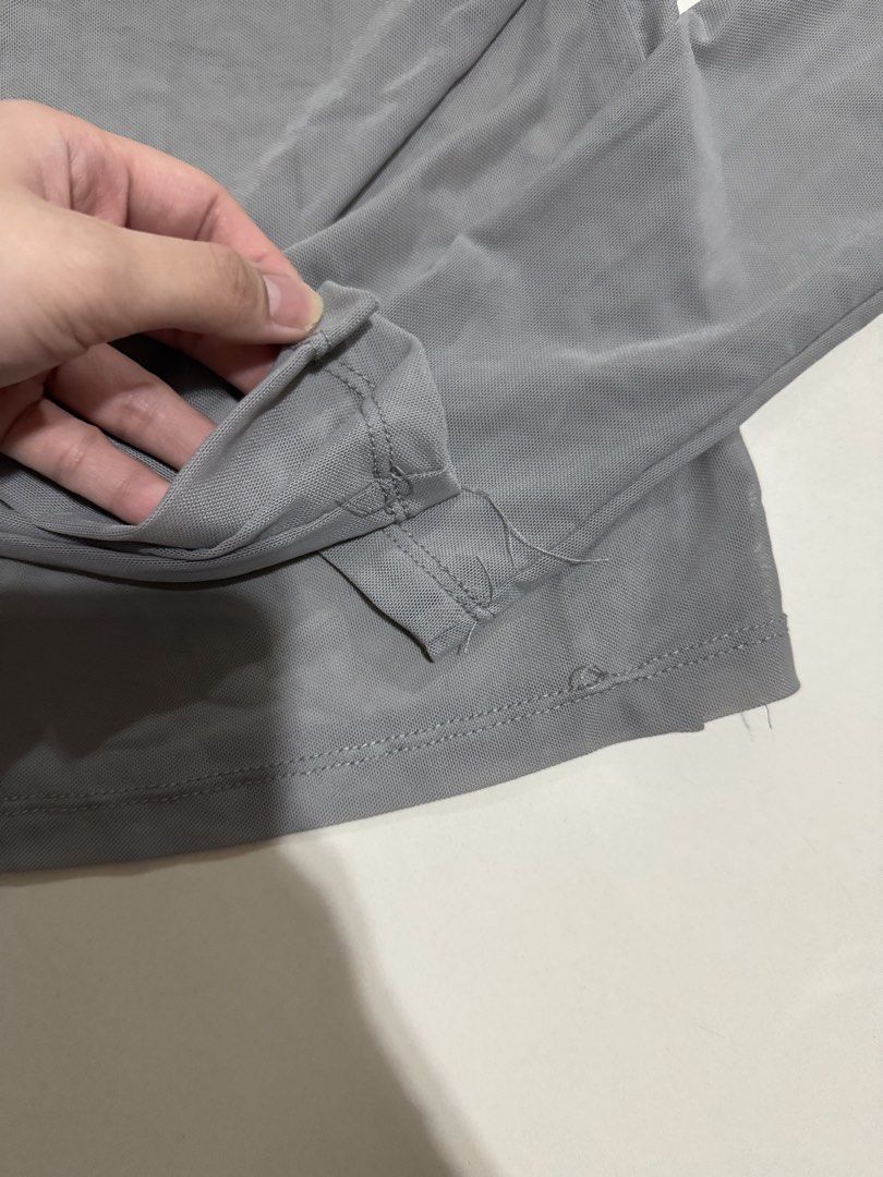 SHEIN Gray Sheer Mesh Long Sleeve Top (Category: Longsleeves) located in Manila. Submitted by buymiclothes.47 (Listing ID 1469741223, Image 3). Description: SHEIN BAE Gray Sheer Mesh Long Sleeve Top Preloved SHEIN BAE gray sheer mesh top. Cute for layering over a bralette or wearing with jeans, skirts, or trousers! * Color: Gray * Sheer / semi-transparent mesh fabric * Fitted silhouette * Long sleeves m * Round neckline * Worn once only * Flaw: S